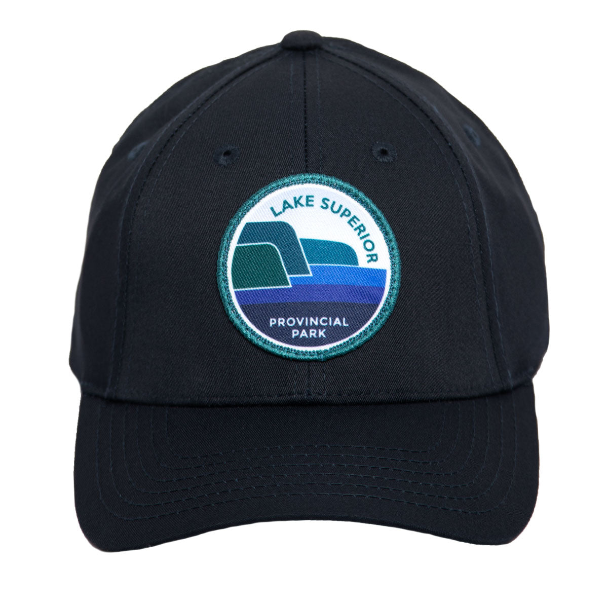 Navy park specific ball cap, featuring embroidered Lake Superior Provincial Park crest. Front view of brim. 
