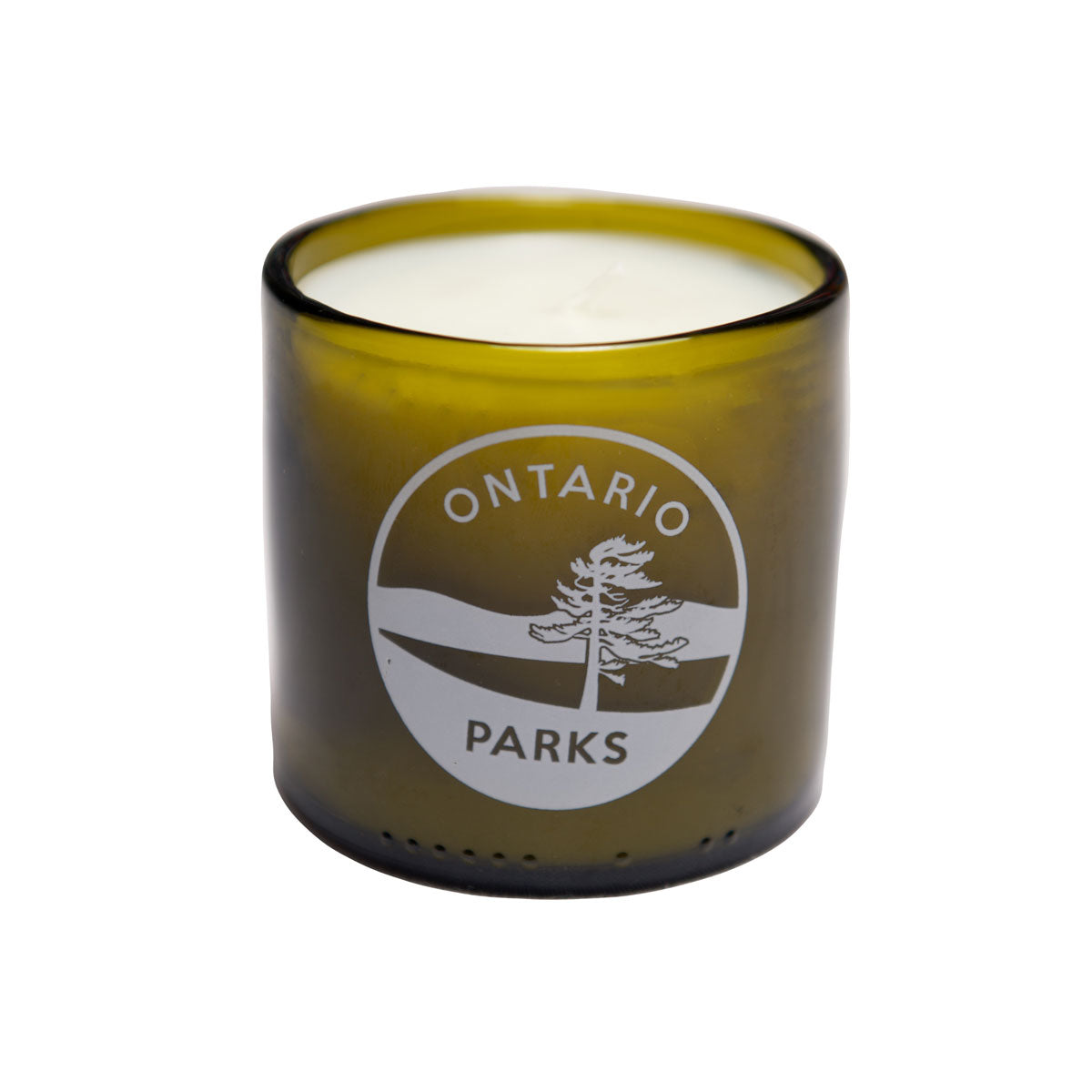 Hand blown glass jar candle in scent Morning Hikes. White Ontario Parks crest screened on glass.