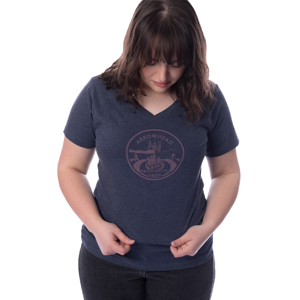 Female wearing heather navy Ladies Fit Park Specific T-shirt V-neck. Pink Arrowhead park crest on centre chest.