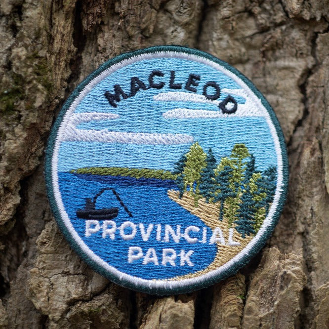 Round embroidered park crest patch for Macleod Provincial Park
