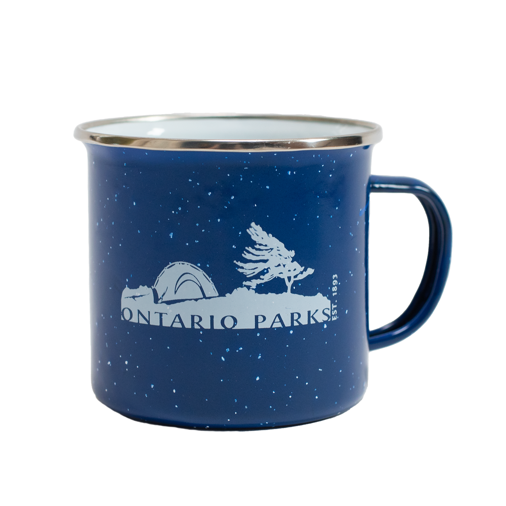 A white-speckled blue tin mug with a graphic of a tent and wind-swept tree with "Ontario Parks est. 1893" in text.