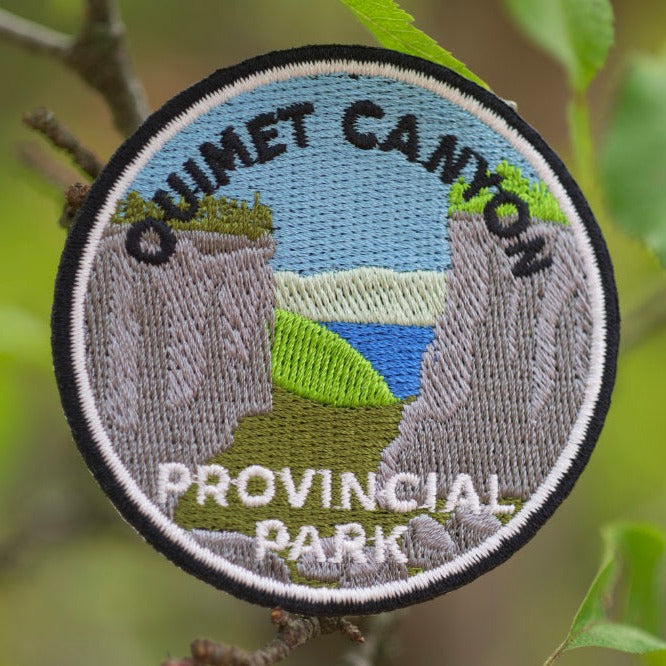 Round embroidered park crest patch for Ouimet Canyon Provincial Park