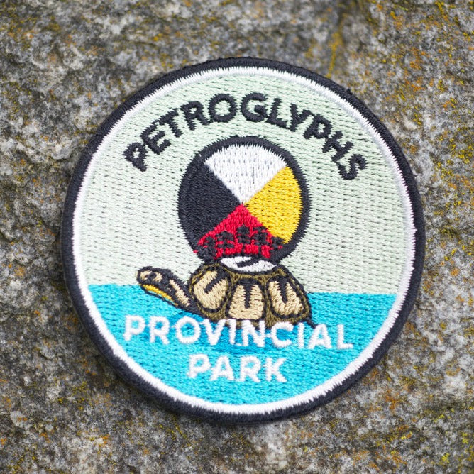 Round embroidered park crest patch for Petroglyphs Provincial Park
