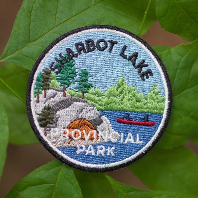Round embroidered park crest patch for Sharbot Lake Provincial Park