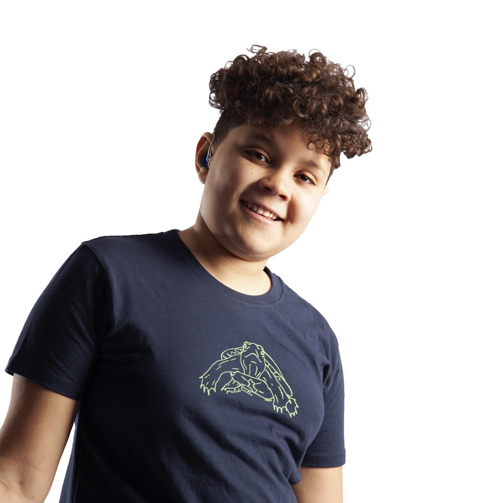 Boy wearing navy Unisex Youth Turtle Protection T-shirt. Yellow turtle graphic screened on centre chest.